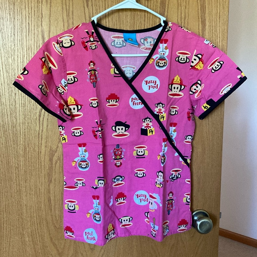 Barely used printed scrub top with Paul Frank design